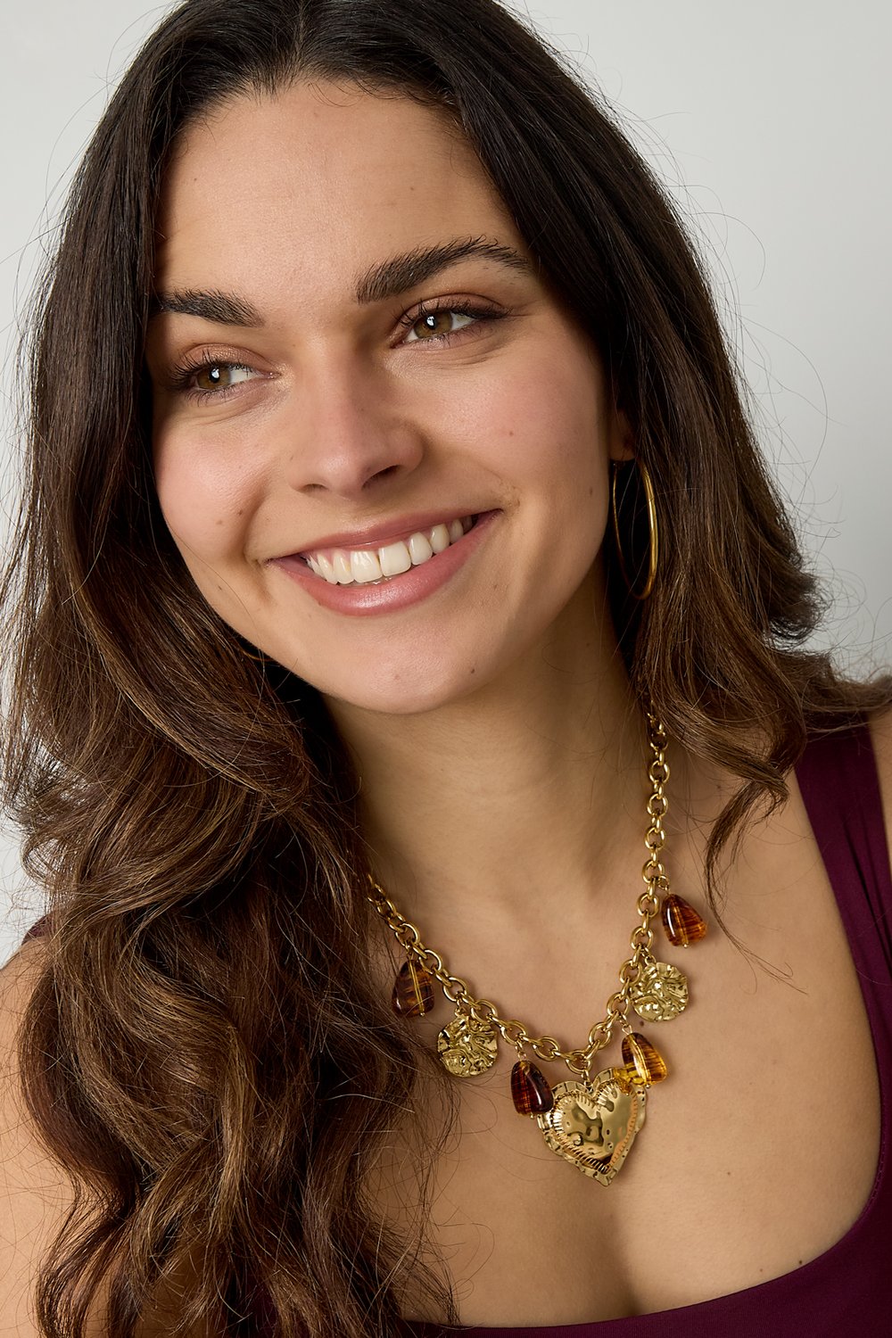 Link chain with dangling beaded coins and statement heart Picture2