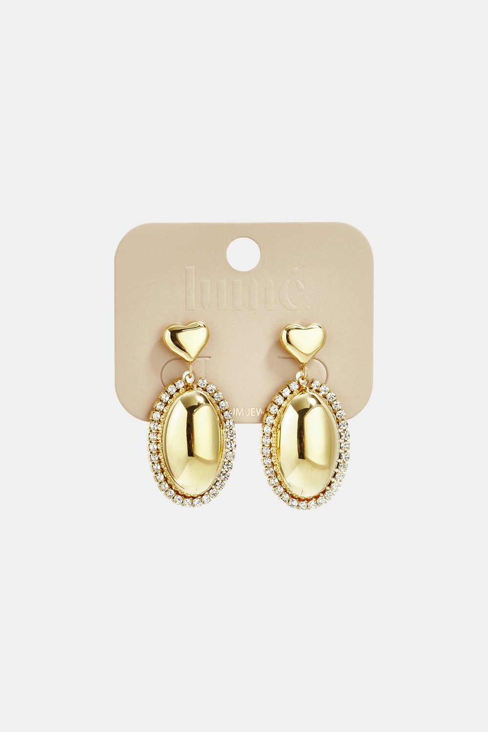 Statement earrings with an oval charm surrounded by stones Picture5