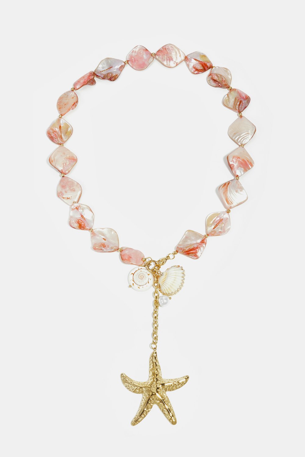 Necklace with seashell beads, charms, and a hanging starfish