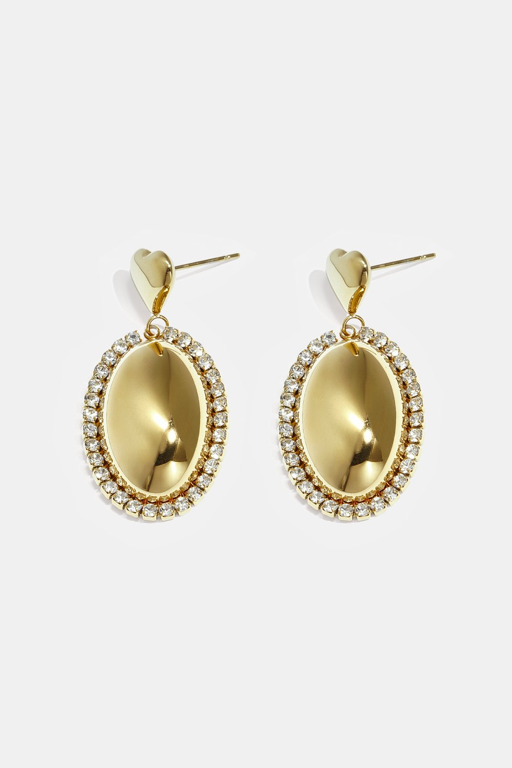 Statement earrings with an oval charm surrounded by stones 