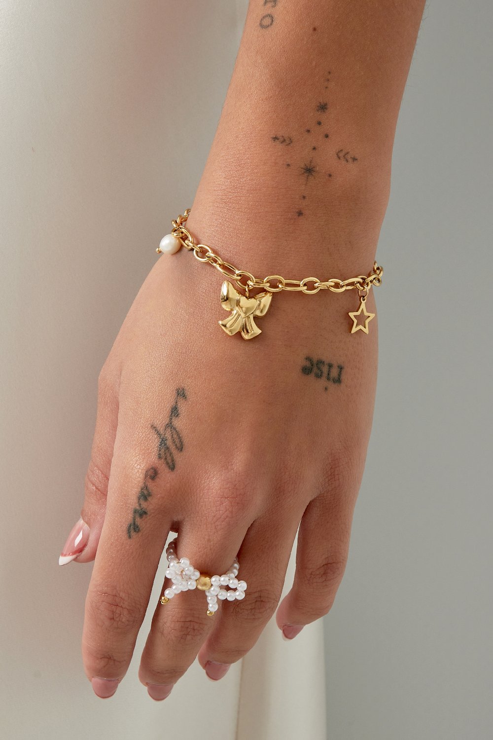 charm bracelet with bow h5Picture2