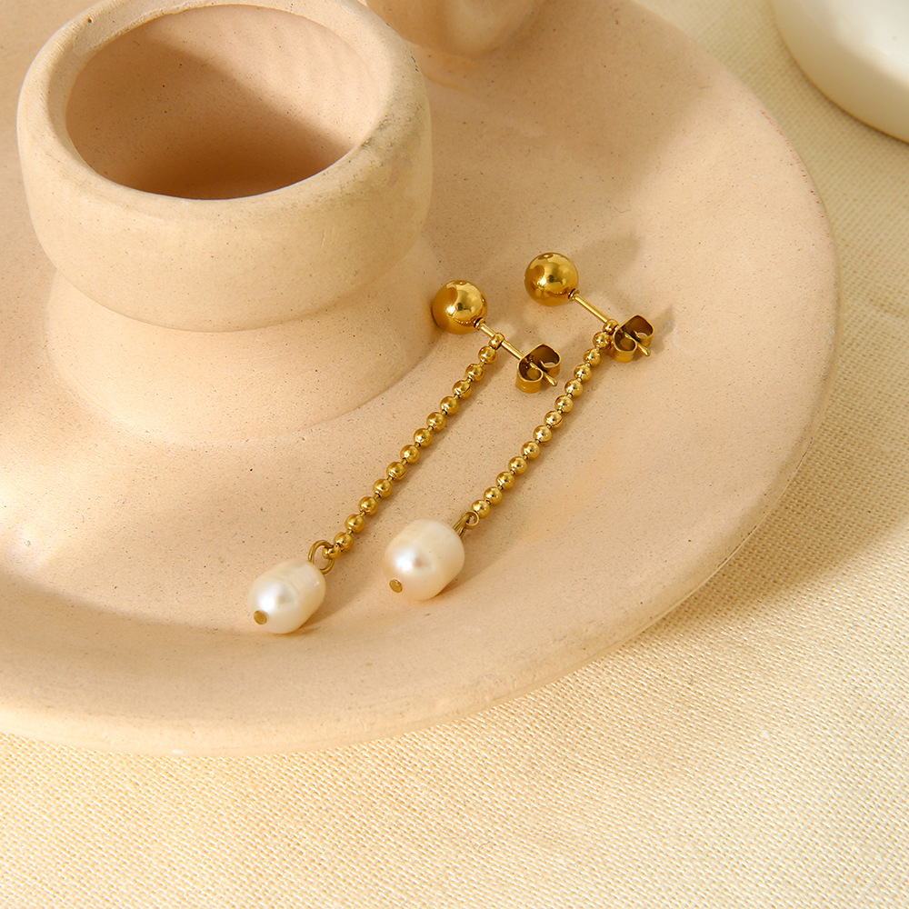 Elegantes pendientes de tortuga de acero inoxidable color dorado para mujer Imagen3