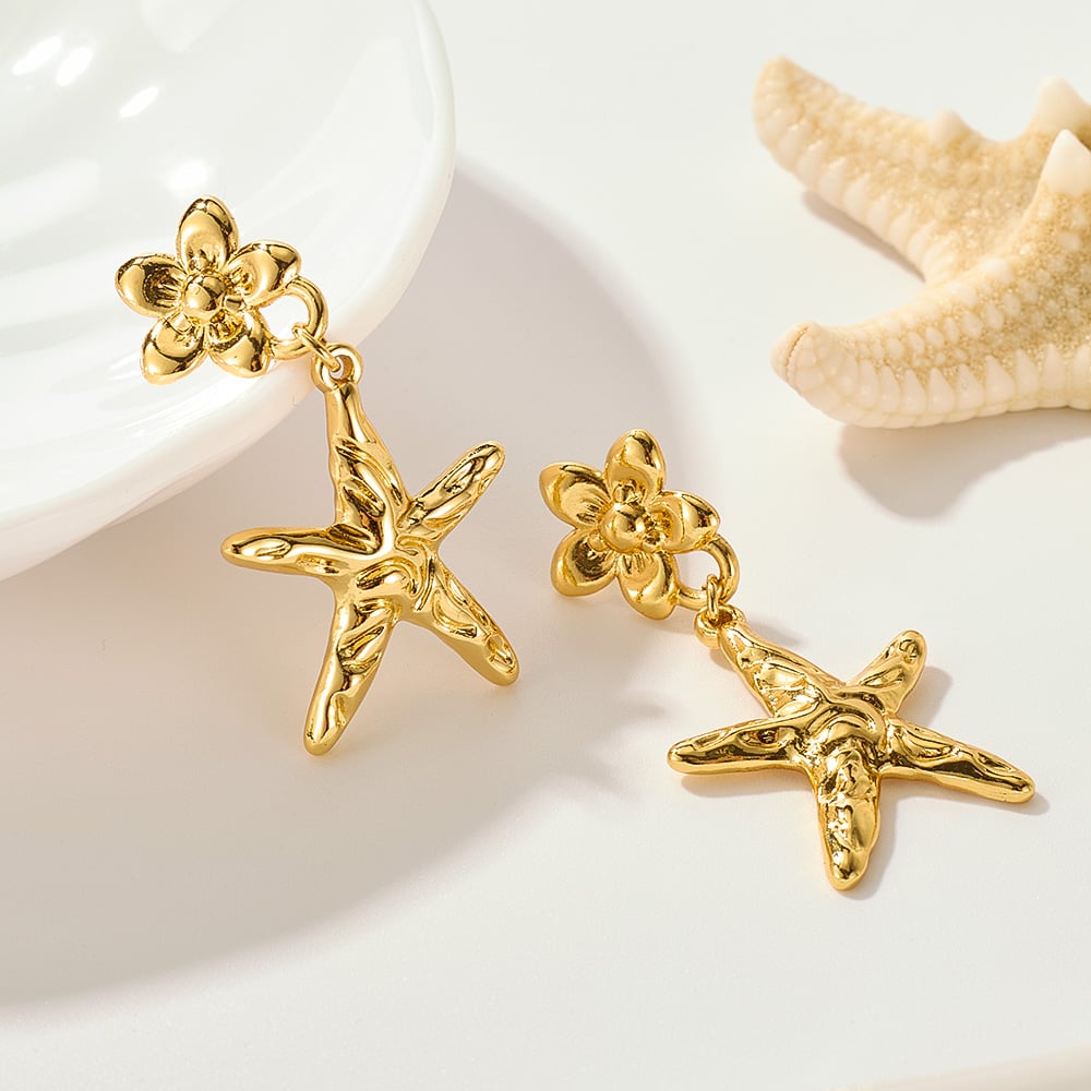 1 paio di orecchini pendenti da donna in acciaio inossidabile color oro a forma di stella marina Immagine4