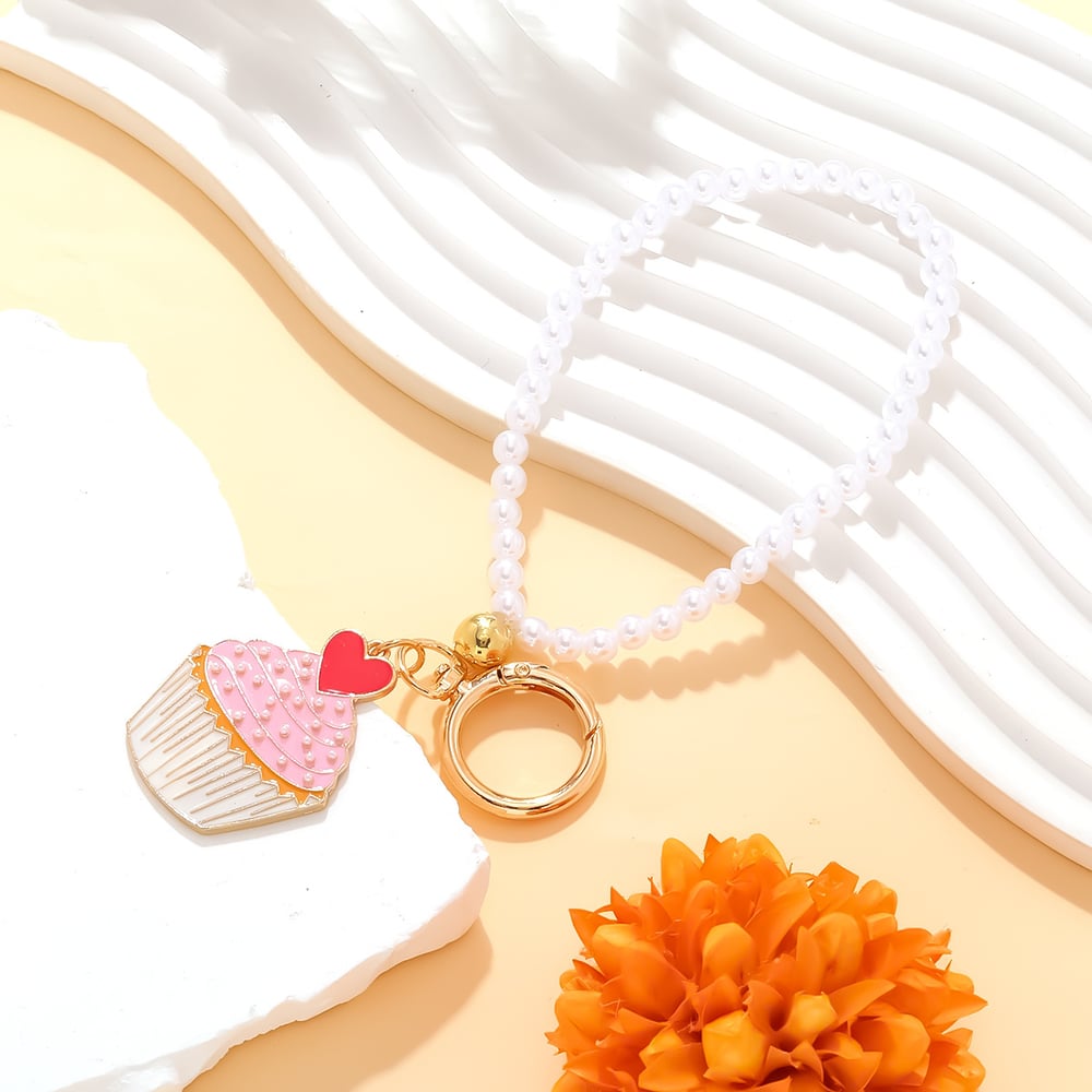 1 llavero de aleación con forma de pastel dulce h5Imagen3
