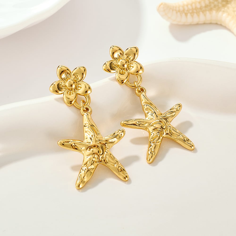 1 paio di orecchini pendenti da donna in acciaio inossidabile color oro a forma di stella marina Immagine8