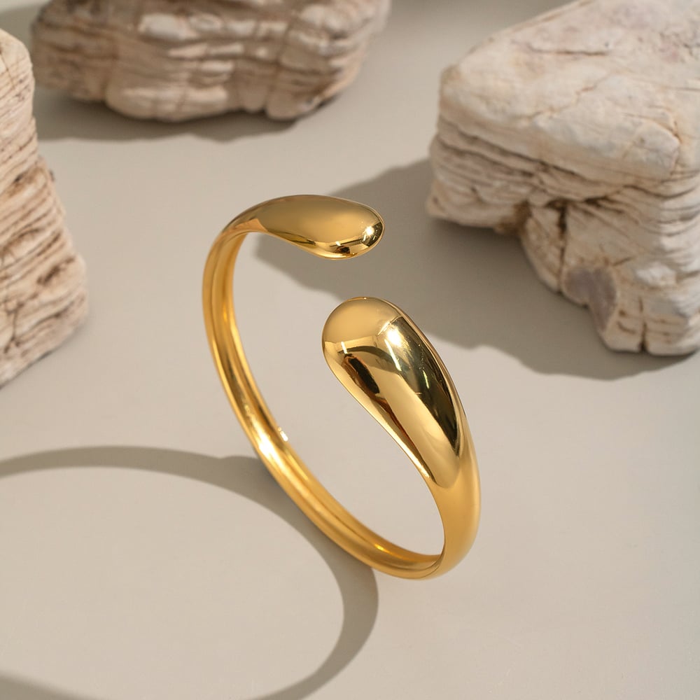 1 brazalete de acero inoxidable dorado con forma irregular Imagen4