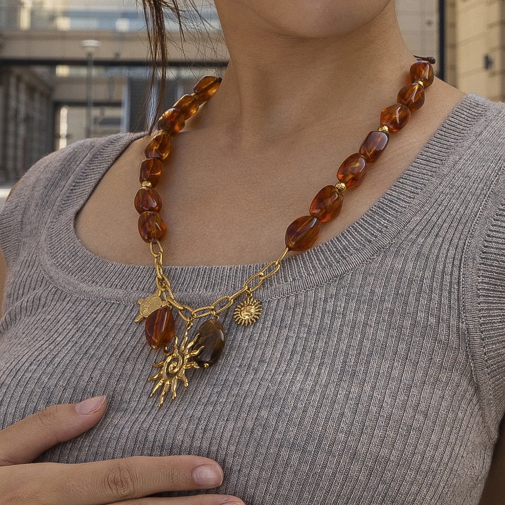 Collana con perline acriliche color oro in acciaio inossidabile con sole, 1 pezzo Immagine3