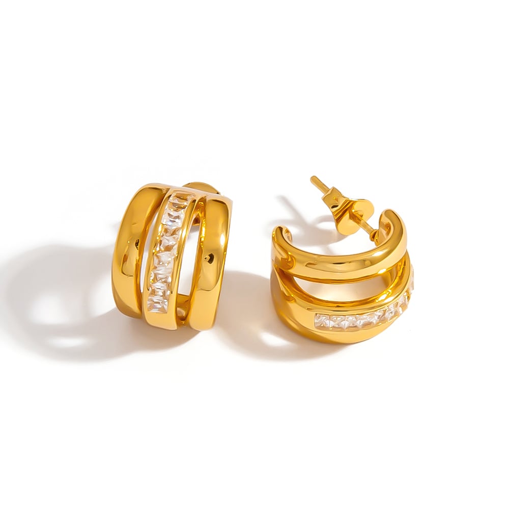 1 par de pendientes de aro de acero inoxidable para mujer, románticos, elegantes y con forma irregular.