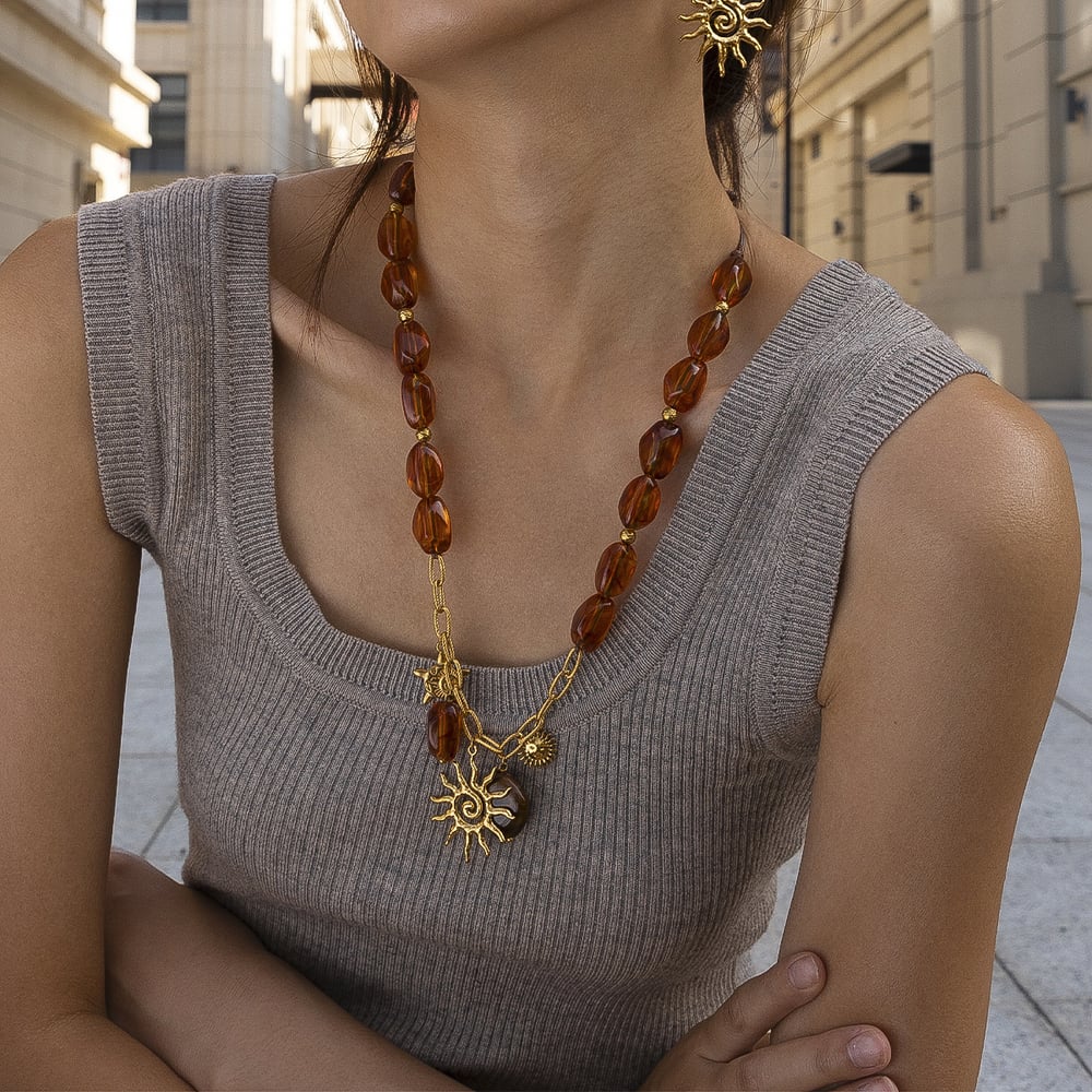 Collana con perline acriliche color oro in acciaio inossidabile con sole, 1 pezzo Immagine2