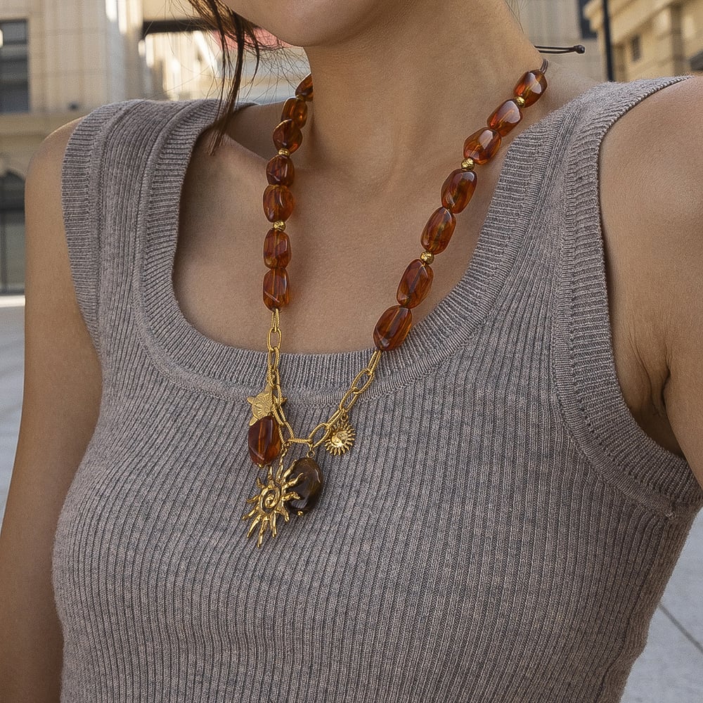 Collana con perline acriliche color oro in acciaio inossidabile con sole, 1 pezzo Immagine4