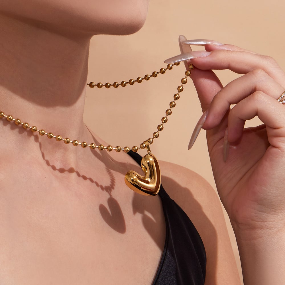 Minimalistische Herz-Anhänger-Halsketten aus Edelstahl in Goldfarbe für Damen h5Bild4