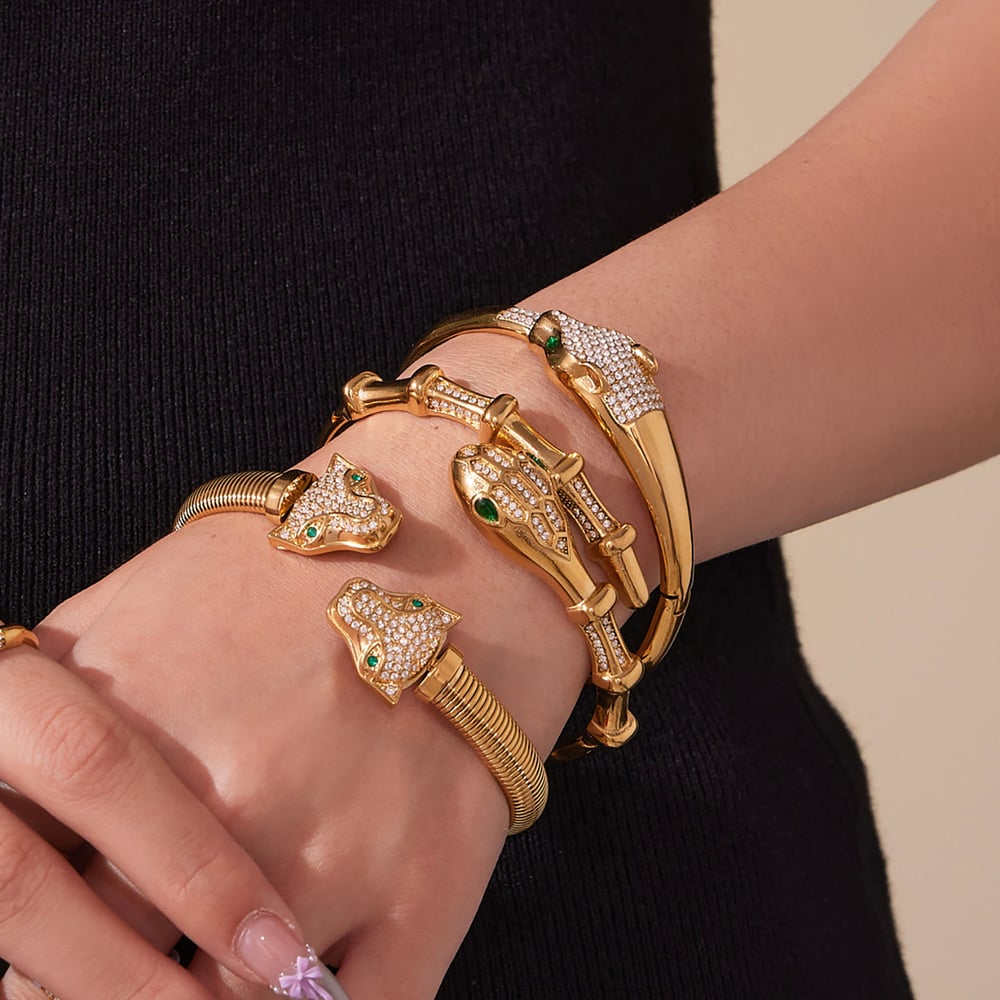1 stuk luxe luipaard- en slangvormige titanium stalen armbanden met goudkleurige zirkonia voor dames Afbeelding4