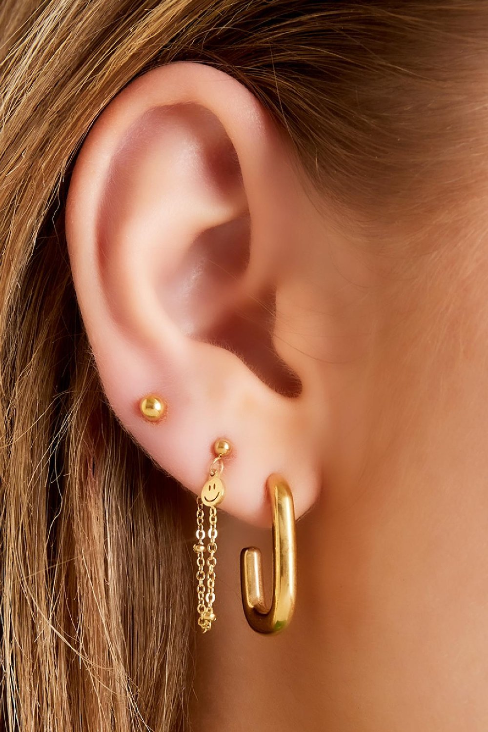 Smiley oorbellen met ketting Goud kleur Stainless Steel Afbeelding2