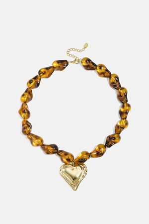 Beaded necklace with naturally shaped beads and a hanging heart h5