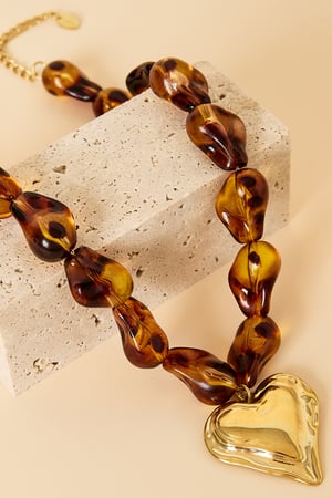 Beaded necklace with naturally shaped beads and a hanging heart h5 Picture3