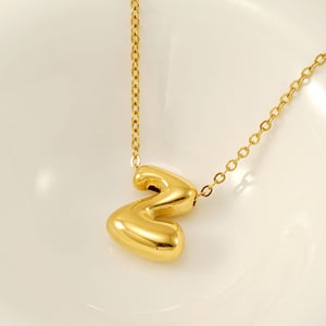 1 Stück Simple Series Daily Letter Titanstahl 18 Karat vergoldete Unisex-Anhängerketten h5 Bild4