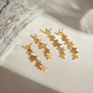 europäischer und amerikanischer grenzüberschreitender -stil, schlichter 18 karat gold-edelstahl, glatte ganze schnur, kleine schmetterlingsquasten-ohrringe, ohrschmuck für frauen h5 Bild3
