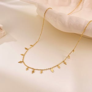 1 pezzo di collana con ciondolo da donna in acciaio inossidabile color oro con forma brillante h5 Immagine7