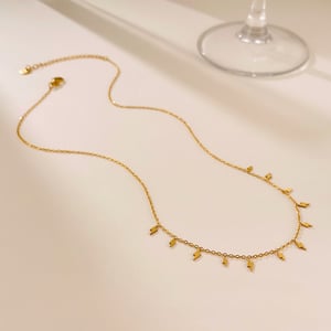 1 pezzo di collana con ciondolo da donna in acciaio inossidabile color oro con forma brillante h5 Immagine8