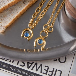 1 Stück luxuriöse blaue Harzkreis-Edelstahl-Goldfarbe Damen-Charm-Armbänder h5 Bild5