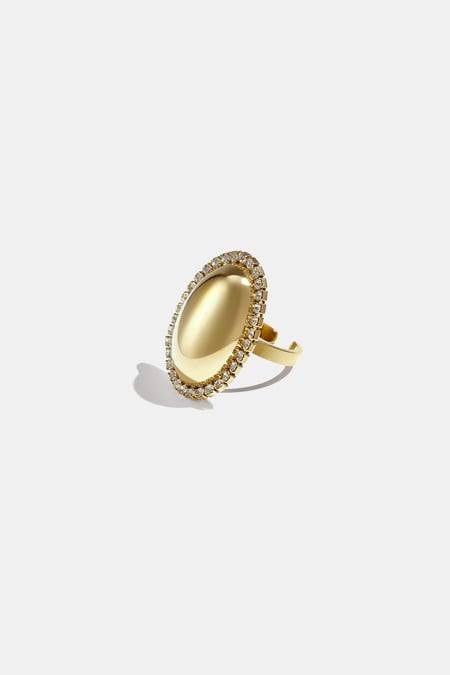 Oval statement ring surrounded by stones 2