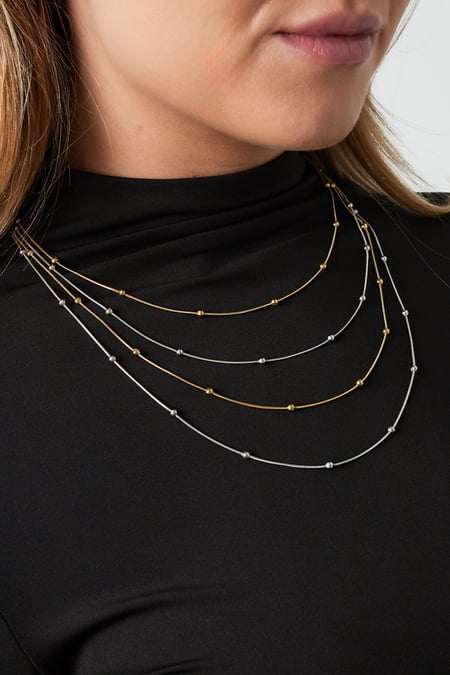 collar de capas con lunares
