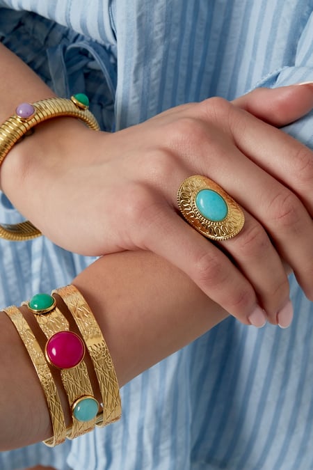 oval ring with green stone