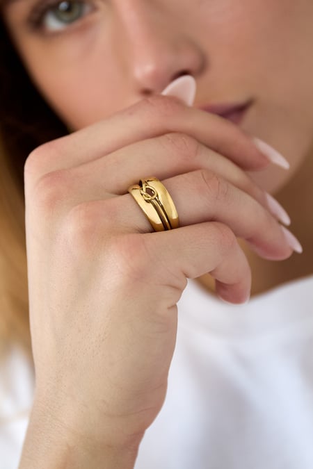 Layered ring with minimalist twisted detail