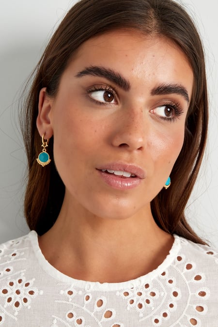 earring with star and charm blue