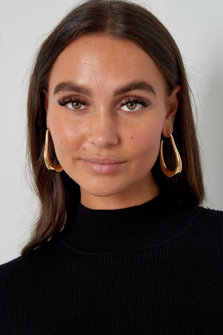 asymmetrical earrings