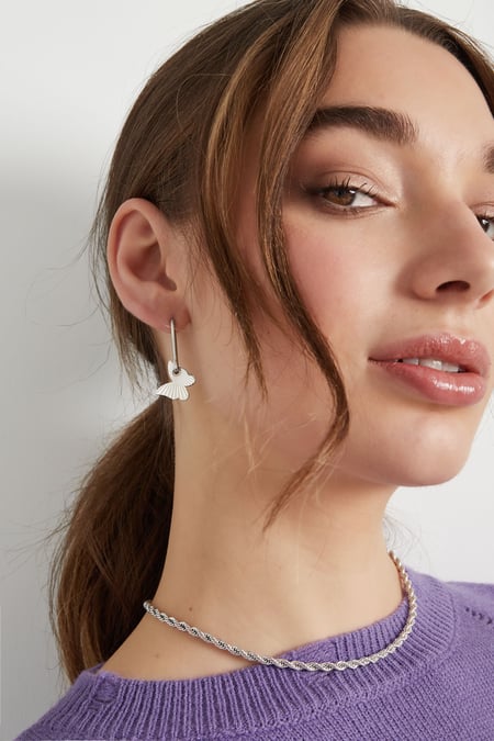 elongated earrings with butterfly