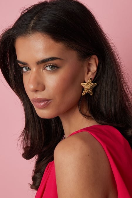 Ezilmiş yıldız küpeler