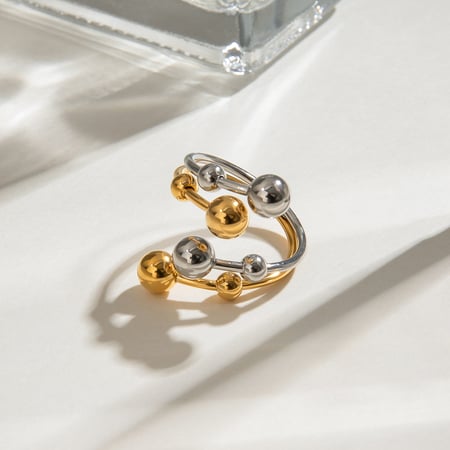 1 paar luxe serie koude wind onregelmatige roestvrij staal vergulde dames verstelbare ringen 2