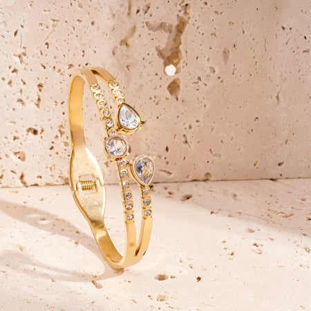 1 stuk luxe serie elegante druppelvormige armbanden van roestvrij staal in goudkleur voor dames