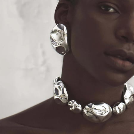 1 paire de boucles d'oreilles à tige irrégulières en acier inoxydable plaqué or pour femme, série simple, vent froid