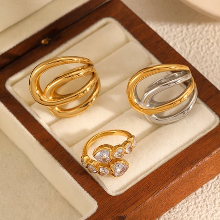 Anillos de lujo para mujer de acero inoxidable dorado con líneas irregulares 2