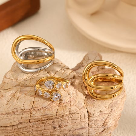 Anillos de lujo para mujer de acero inoxidable dorado con líneas irregulares