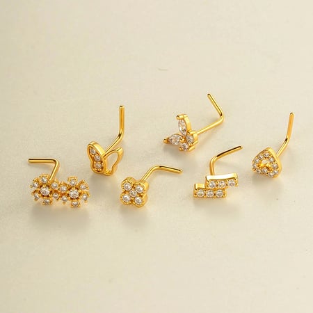 1 piercing para la nariz con circonita color cobre y dorado. 2