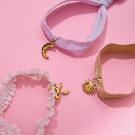 Bracelet à breloques pour femme en acier inoxydable couleur or avec nœud papillon 2