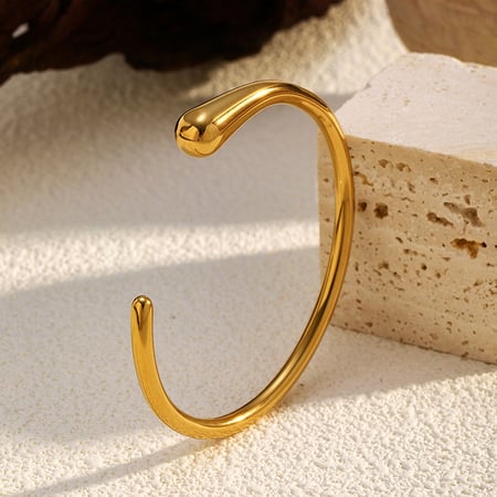 1 Stück einfaches kreisförmiges Manschettenarmband aus Edelstahl in Goldfarbe 2