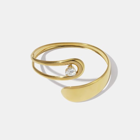 Ausgehöhltes, unregelmäßig geformtes Manschettenarmband aus Edelstahl mit Zirkonia