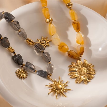 Collana con perline color oro acrilico a forma di sole e fiore, 1 pezzo
