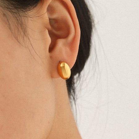 1 juego de pendientes de botón de acero inoxidable con circonitas de color dorado y forma irregular para mujer