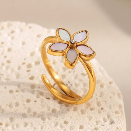 1 anillo llamativo de acero inoxidable con diseño de flor elegante y concha de color dorado.