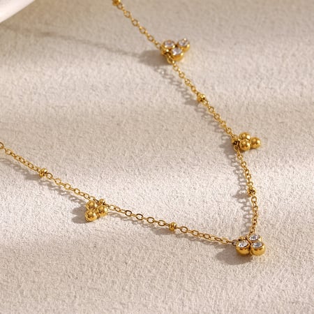 Collier simple et élégant en acier inoxydable doré pour femme, motif floral