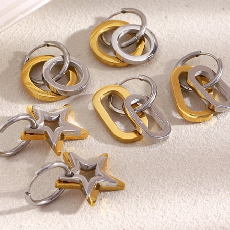 1 par de pendientes colgantes de acero inoxidable con forma de estrella, en colores dorado y plateado, para mujer.