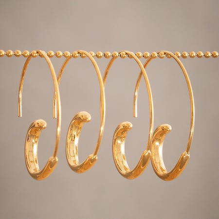 1 paio di orecchini a cerchio minimalisti irregolari in acciaio inossidabile color oro da donna