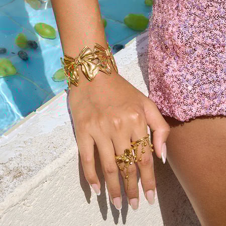 Braccialetti da donna in acciaio inossidabile color oro con nodo a fiocco, 1 pezzo