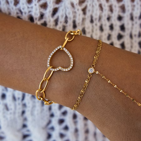 1 pulsera exquisita de acero inoxidable con forma de corazón en color dorado para mujer.