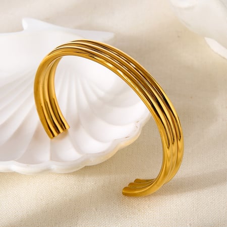 1 pulsera de puño de acero inoxidable con forma circular, sencilla e informal, color dorado para mujer.